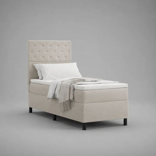 Lit continental simple rembourré beige avec matelas 90 × 200 cm et tête de lit capitonnée, dimensions totales 100 × 210 × 145 cm